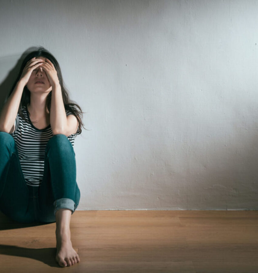 woman experiencing emotional distress from marijuana addiction