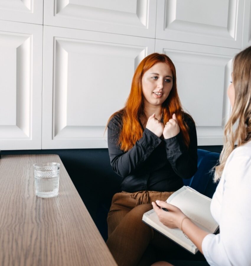 A patient listening to her therapist at addiction and OCD treatment in Los Angeles, CA